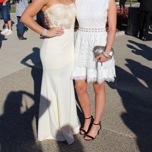 Cream color homecoming/prom dress.